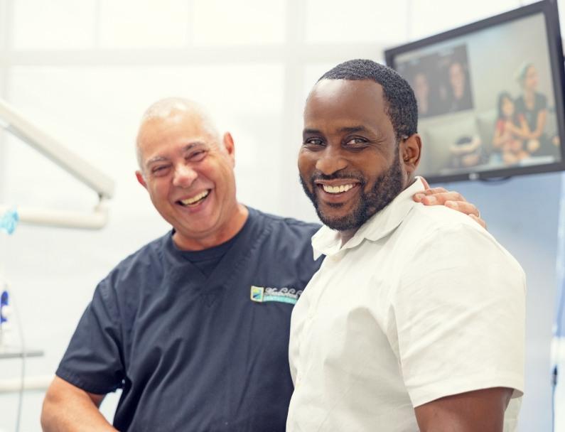 dental patient at a consultation for implant dentures in Plainview